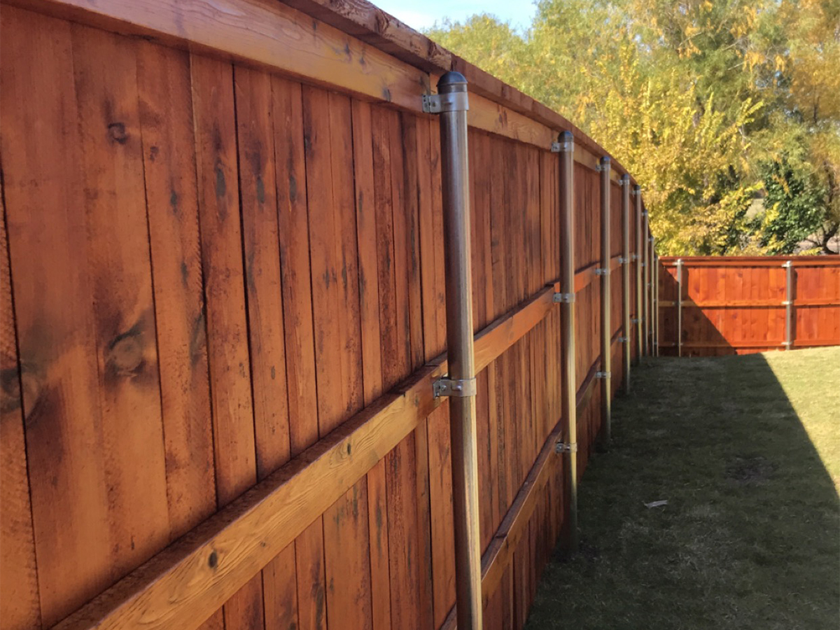 Photo of a stained wood privacy fence